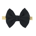 Soft black waffle knit bow headband for babies with a seamless nylon band design - Black