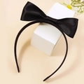 Elegant black satin bow headband for women with a minimalist vintage French style design - Black