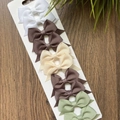 Set of 10 ribbed bow hair clips in natural tones on a wooden background - Multiple Packs / White Brown Beige Coffee Green Set