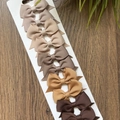 5-piece set of brown grosgrain ribbon bow hair clips on card over a dark wooden background - Multiple Packs / Earth Tone Gradient Set