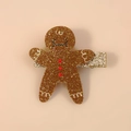 Sparkly gold gingerbread man Christmas hair clip with red polka dots and glitter finish - Gingerbread Man