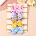 Set van 5 effen baby hoofdbanden met strik in de kleuren roze, paars, geel en blauw - Combinatie 1
