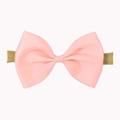 Detailed macro view of pink grosgrain bow hair band with elastic tie for baby girls - Snow Bud