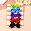 Set van vijf elastische baby-haarbanden met kleurrijke grosgrain lint strikken op kaart - Combinatie 4