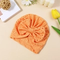 Breathable orange baby turban hat featuring a large bow and hollow mesh fabric - Orange