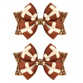 Detail shot of American football hair bows with brown ribbon and gold sequins - Rugby Football Style