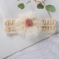 Close-up of baby headband with cream crochet elastic band and large tulle flower detail - Style 7