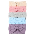 Detail of five soft nylon baby headbands in pastel colors showing the stretchable fabric texture - Display Set 2 (8 PCS)