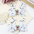 Sparkly white sequin Christmas reindeer antler hair clips with candy cane bow detail - White Bow Candy Cane Style