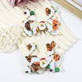 Handmade Christmas hair clips with sequins, reindeer antlers, and Santa Claus figures - White Sequin Stripe Santa Style