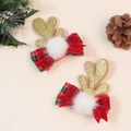 Handmade Christmas hair clips featuring red velvet bows, reindeer antlers and white pom poms - Style 1