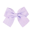 Nœud à cheveux en tissu violet clair avec texture tissée et design élégant et doux - Violet