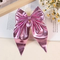 Elegant large pink bow hair clip with metallic finish and long streamers for women - Pink