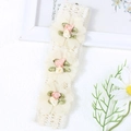 Baby floral lace headband with cream fabric roses and green leaves on soft elastic band - White