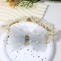 Elastic baby girl headband with a white mesh bow and elegant pearl embellishments - Gray