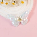 Accessorio per capelli a farfalla azzurro con paillettes e fiore bianco centrale - Stile Blu Chiaro