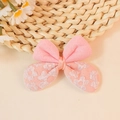 Roze stoffen strik haaraccessoire met witte madeliefjesprint en lint in het midden - Watermeloen Rood