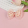 Nœud en maille rose double couche avec ailes à paillettes pour cheveux d'enfants - Bourgeon de Neige