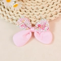Pink floral fabric bow with layered double design and pink ribbon center for DIY crafts - Pink