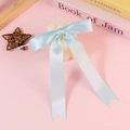 Light blue satin bow with long ribbons and a transparent clip on a pink background - Without Ties / Light Blue