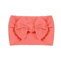 Soft nylon infant headband featuring a large coral pink bow with stretchable knit fabric - Watermelon red