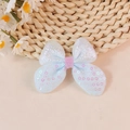 Sparkly light blue sequin bow applique with pink glitter center for DIY clothing and hair decor - Blue