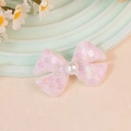 Sweet pink sequin bow hair accessory with central white pearl on a pastel stand - Light Pink (#4)