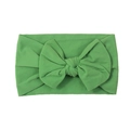 Grass green nylon baby headband featuring a soft elastic band and large handmade bow - Green