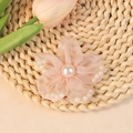 Pink tulle mesh flower accessory with small white pearls on a woven straw mat - Light Pink (#3)