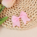 Pink grosgrain ribbon bow decoration for DIY crafts on a natural woven background - Pink (#15)
