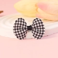 Classic black and white checkered bow hair clip on a soft pink decorative background - Black and White Gingham (#12)