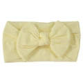 Soft nylon baby headband with large handmade bow in pale yellow cream color - Milk White