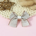 Beige polyester bow accessory with brown edging on a decorative woven mat background - Beige Webbing With Brown Edge (#1)