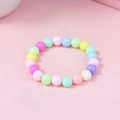 Detail view of colorful 6mm acrylic macaron beads on an elastic stretch bracelet - Round Bead Style (#1) / Multicolor (#1)