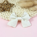Elegant white crepe bow accessory with wrinkled texture and satin center for hair or clothing - White Wrinkled Crepe (#5)