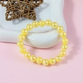 Charming candy yellow plastic pearl elastic beaded bracelet for girls and kids - Yellow