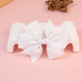 Elegant white ribbed ribbon bow hair accessory with V-cut swallowtail on pink background - White