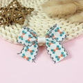 Handmade polyester bow with teal geometric print and orange accents for hair accessories - Geometric Print Cyan Edge (#11)