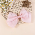 Pink layered organza hair bow with sparkling silver rhinestones on a woven mat - Coral Pink (Style 6)