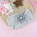Elastic nylon baby headband in light grey with a mesh flower and pearl embellishment - Light Gray