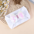 Elastic baby headband with a large sequined pink and white bow on soft knit fabric - White