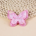 Dettaglio di farfalla in tessuto rosa a strati con paillettes e cuciture rifinite - Rosa (#1)
