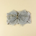 Elastic baby headband featuring a light blue mesh bow with golden sequins - Gray