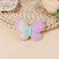Macro detail of gradient bow accessory with shimmering fabric and centered white pearls - Pink Cyan Gradient (#4)