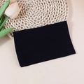 Minimalist elastic black nylon headband for babies on a natural woven mat background - Black (#11)