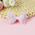 Fiocco per capelli rosa glitterato con paillettes a farfalla e centro in raso su rosa - rosa acceso
