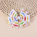 Handmade ribbon hair clip with colorful crayon style prints and cute smiley decoration - White Crayon Smile Faces