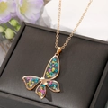 Floral butterfly pendant necklace with real dried flowers in a golden alloy chain setting - Multicolor Butterfly Necklace