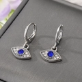 Orecchini huggie a occhio del diavolo in lega d'argento con zircone blu e cristalli - Orecchini Malocchio Argento
