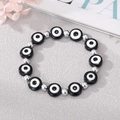 Bracelet rétro œil de démon avec perles en résine bleue translucide et perles argentées - Noir